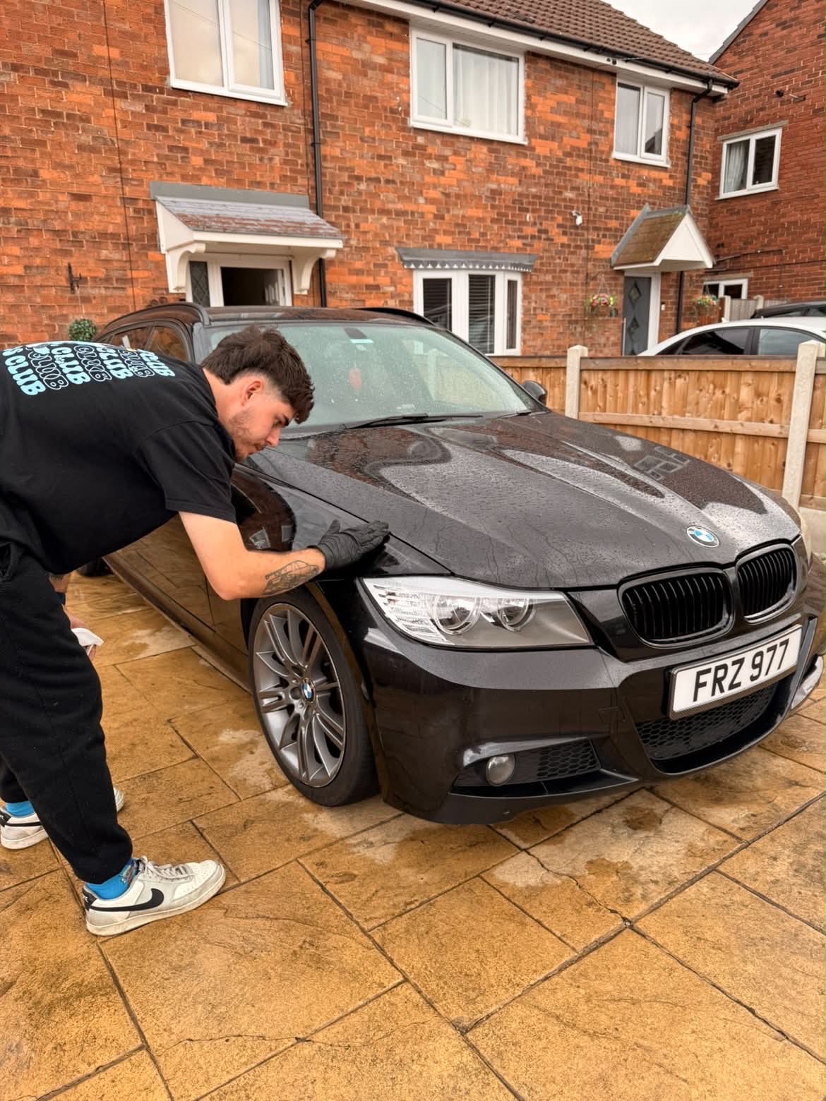 FRZ Detailing polishing a black BMW